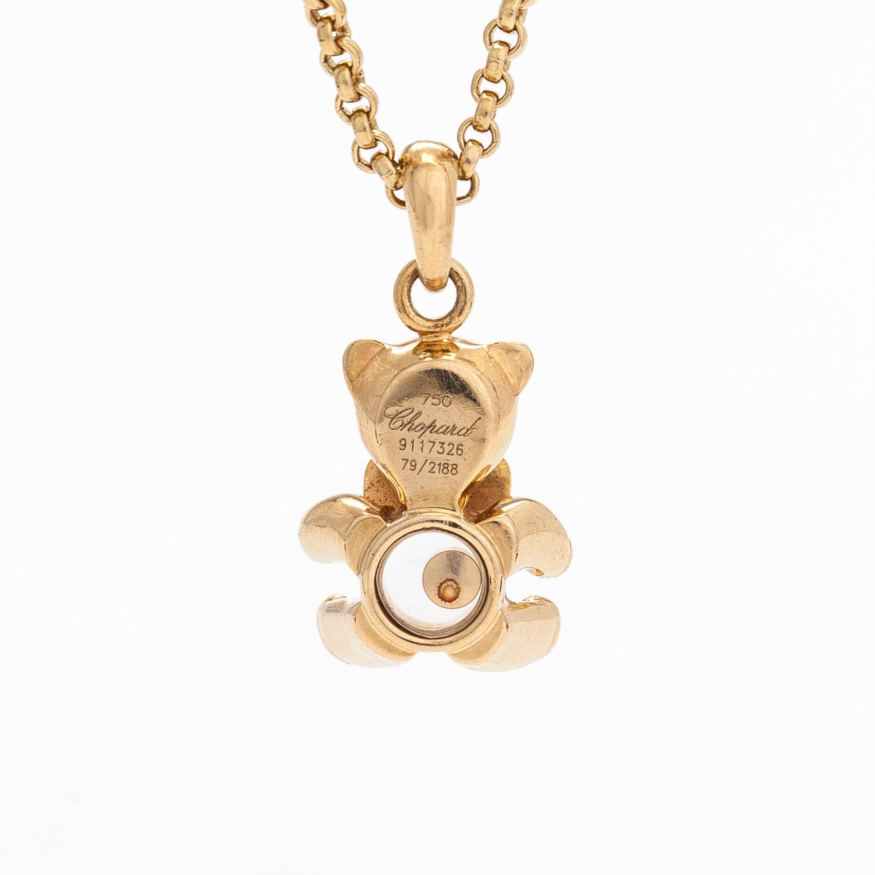 Chopard, an 18K gold 'Happy Diamonds Teddy Bear' pendant necklace.