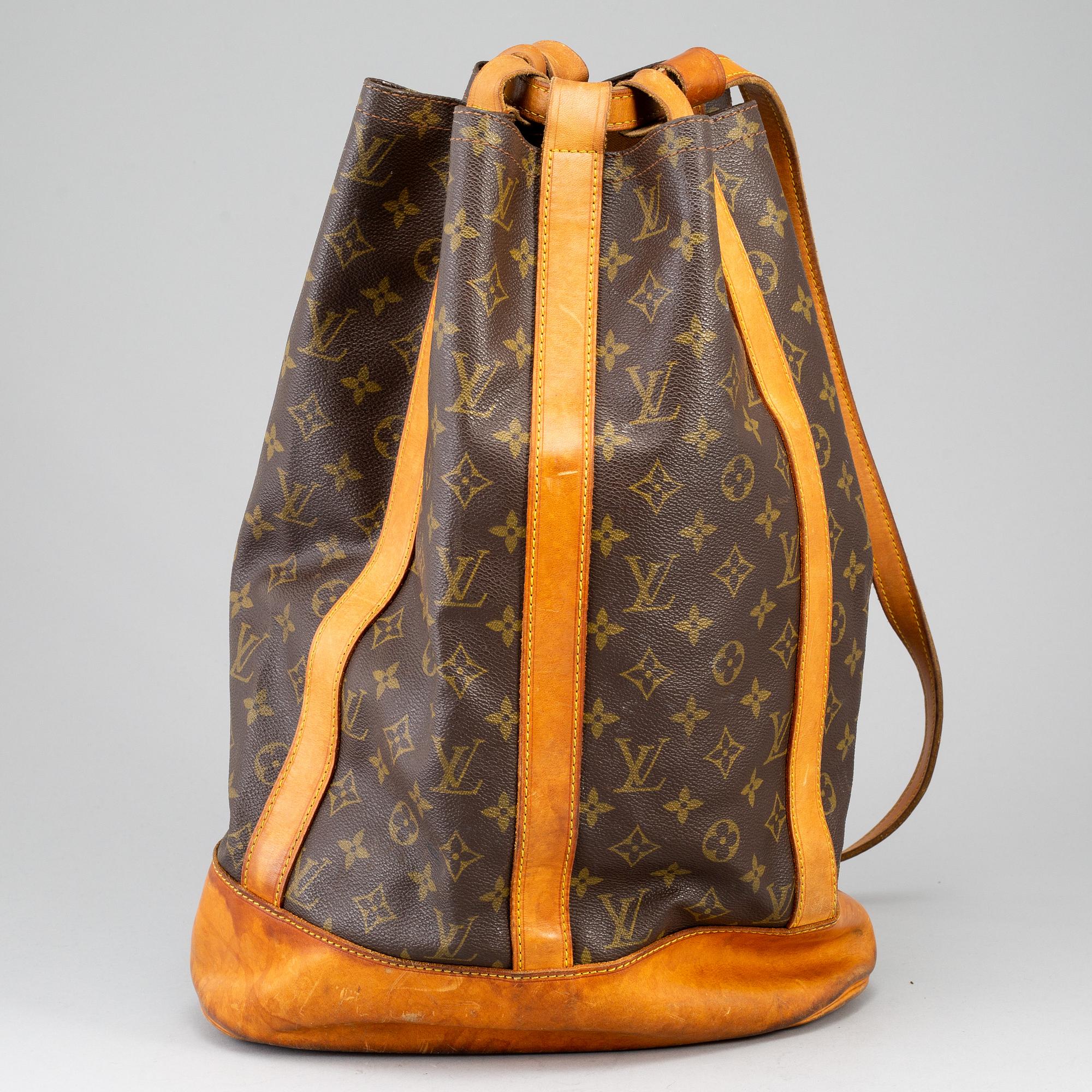 LOUIS VUITTON, a 'Randonne' monogram canvas handbag.