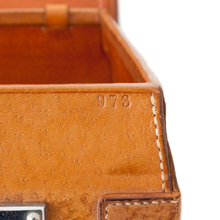 PALMGRENS, a leather suitcase.