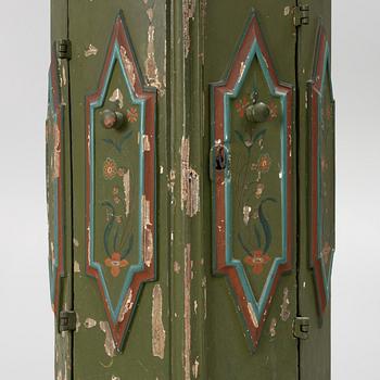 Corner cabinet, likely 18th century.