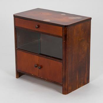 A 1930s functionalist style chest of drawers.