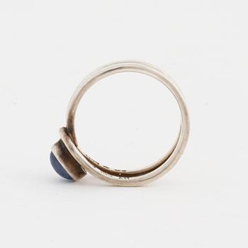 A cabochon cut blue stone ring by Anders Högberg, Göteborg,1986.