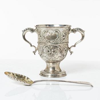 A British silver cup, mark of Thomas Wallis I, London 1773 and a silver spoon, mark of Thomas Northcote, London 1789.