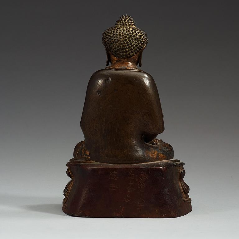 A gilt bronze figure of Buddha Sakyamuni, Ming dynasty (1368-1644).