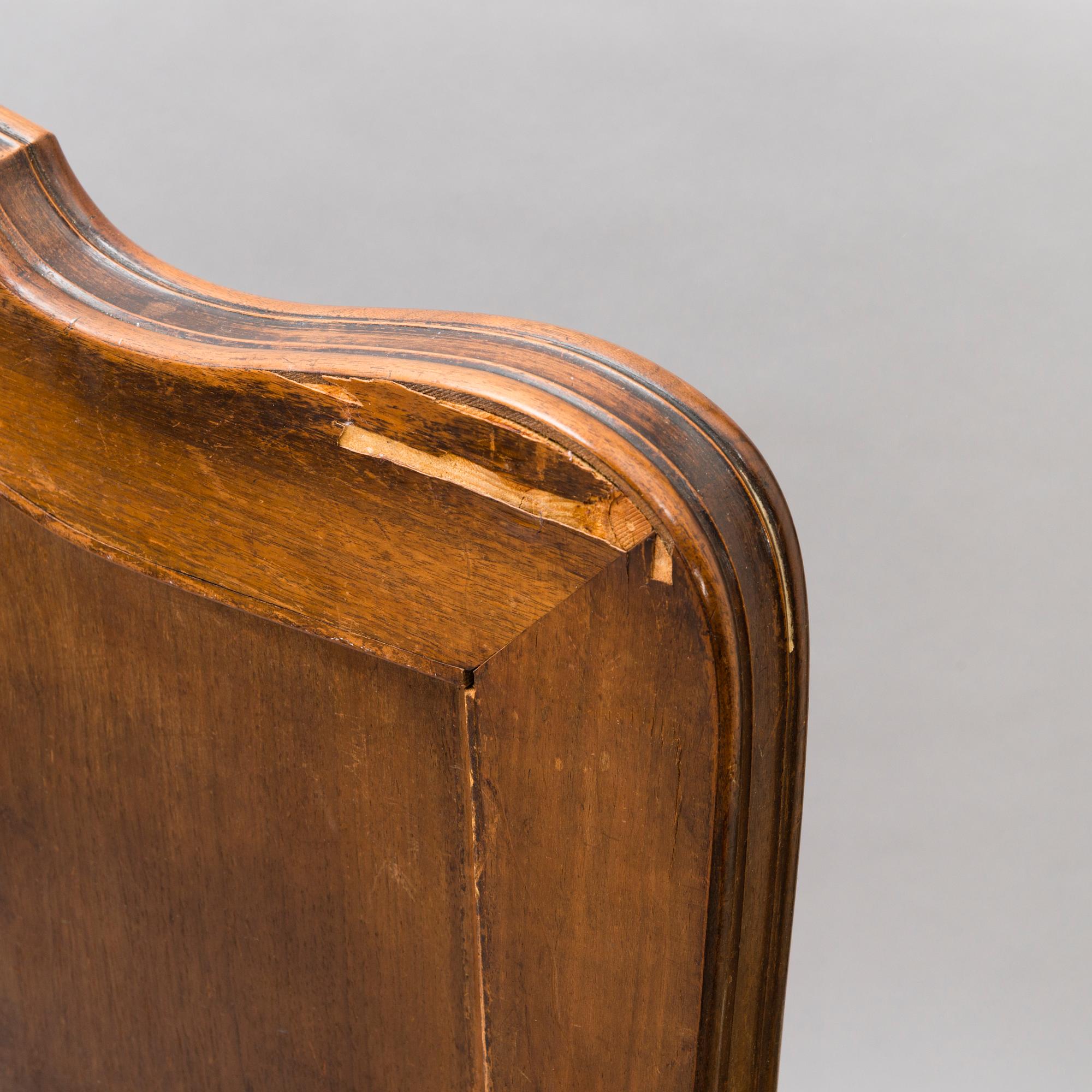 A pair of early 20th Century art nouveau style beds.