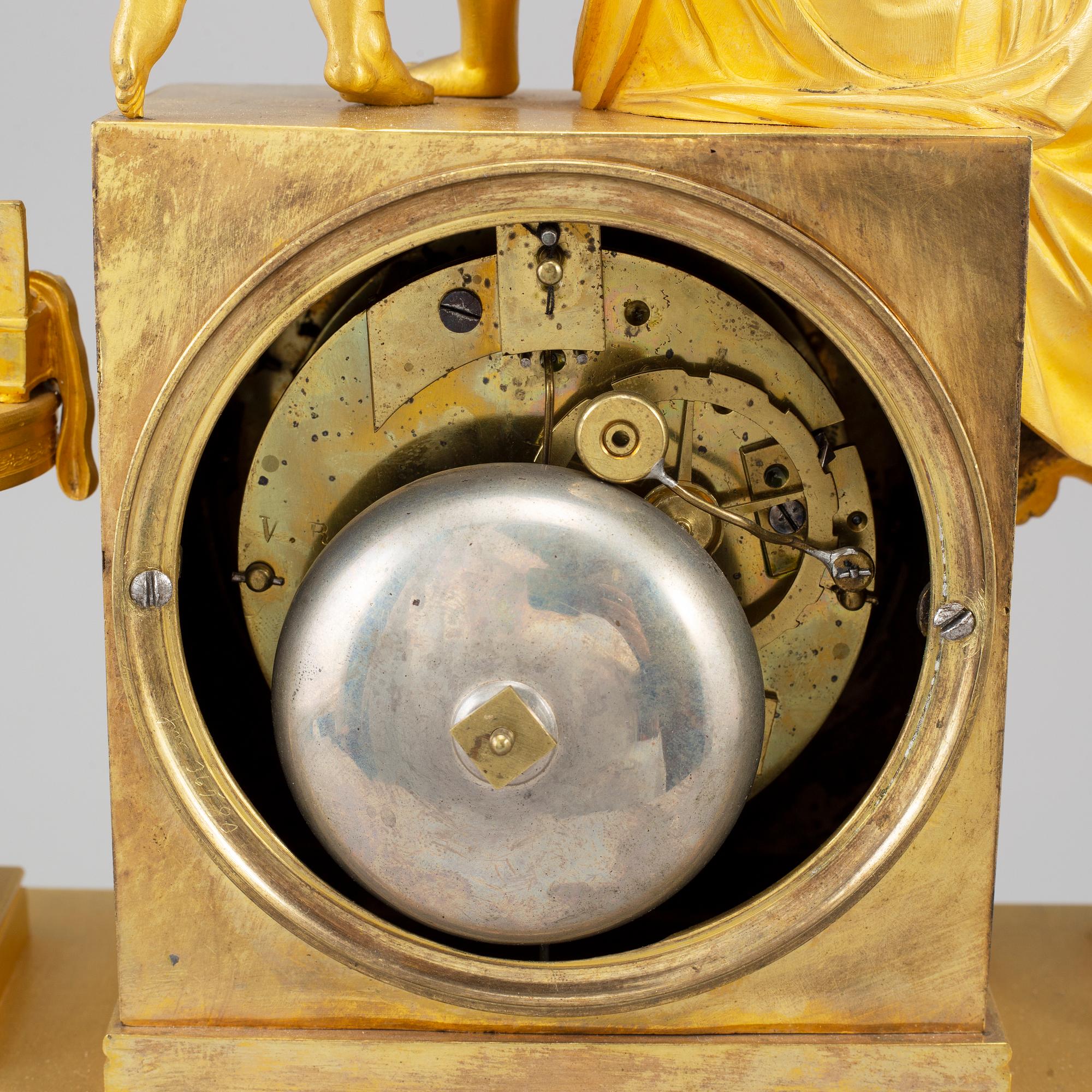 A French Empire pendulum clock, early 19th century.