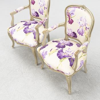 A pair of rococo style armchairs, 20th Century.