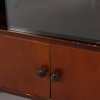 A 1930s functionalist style chest of drawers.