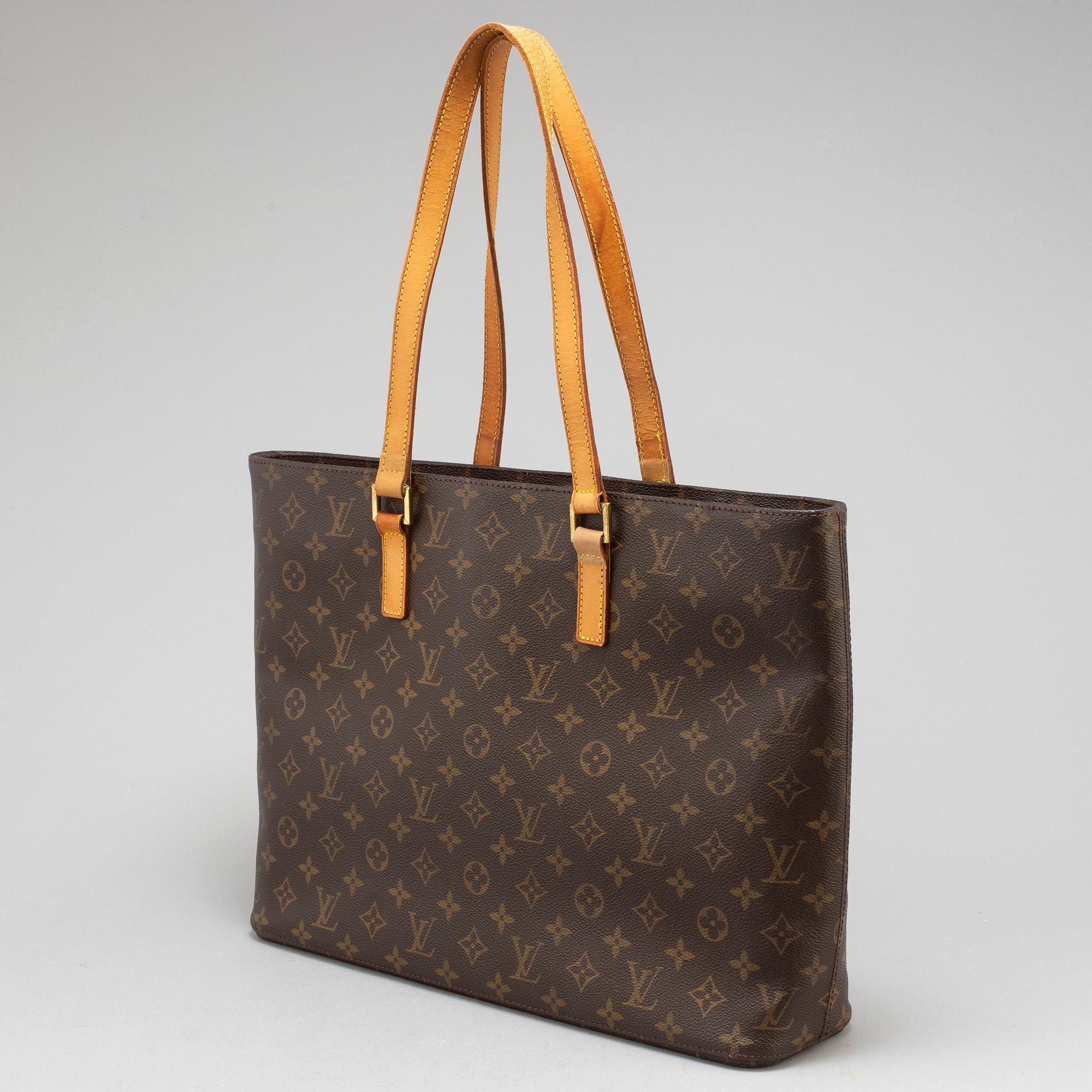 LOUIS VUITTON, a monogram canvas 'Luco' bag.