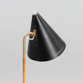 A mid-20th century standard lamp model K10-10 for Idman.