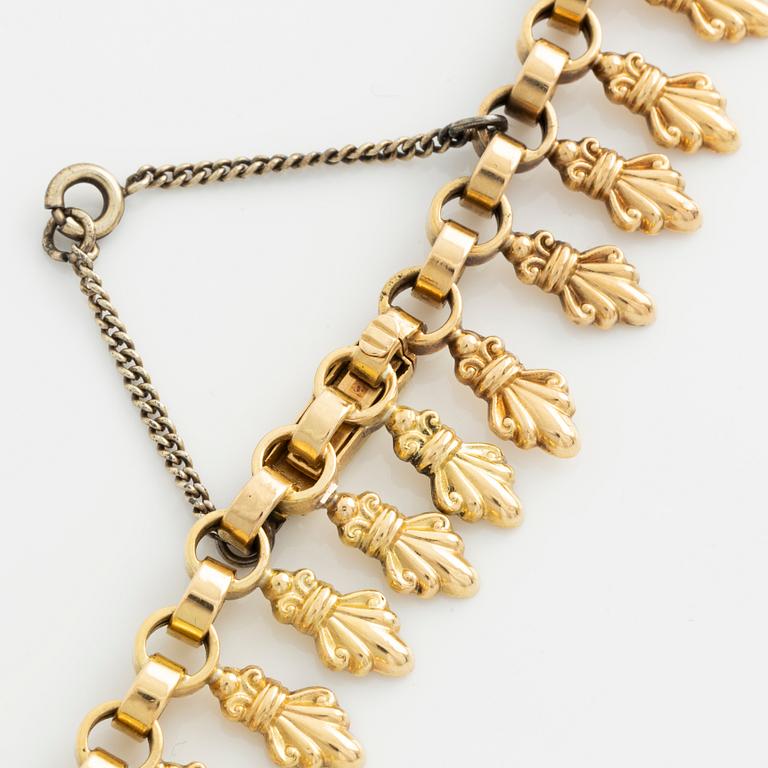 18K gold necklace.