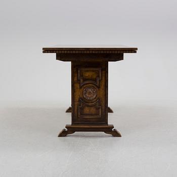 A 1920´s dinner table and six chairs probably designed by Axel Einar Hjorth for AB Svenska möbelfabriken Bodafors.