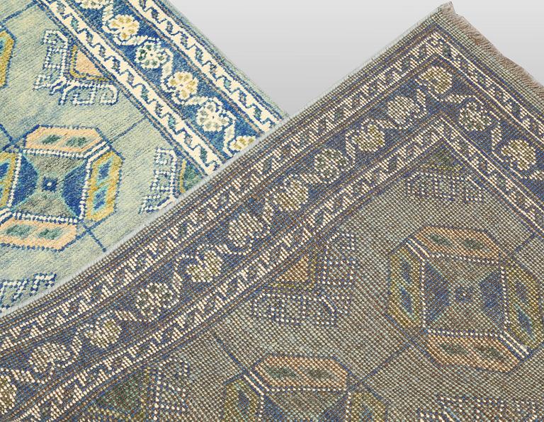 An Oriental runner, c. 296 x 77 cm.