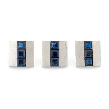 531. Three platinum Boucheron shirt buttons with step-cut sapphires.