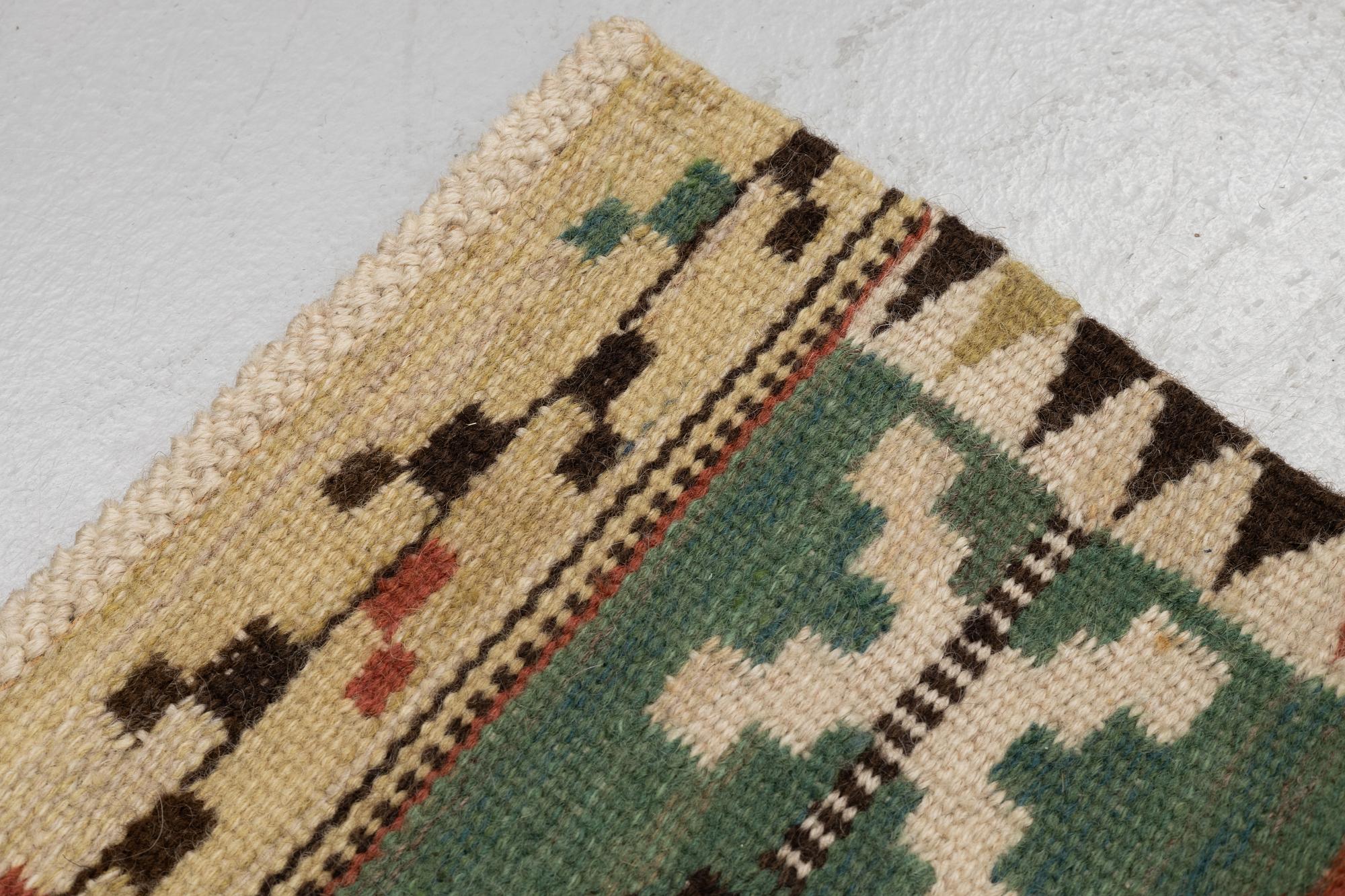 Märta Måås-Fjetterström, A textile, "Rabatten", flat weave, ca 132 x 42 cm, signed MMF.