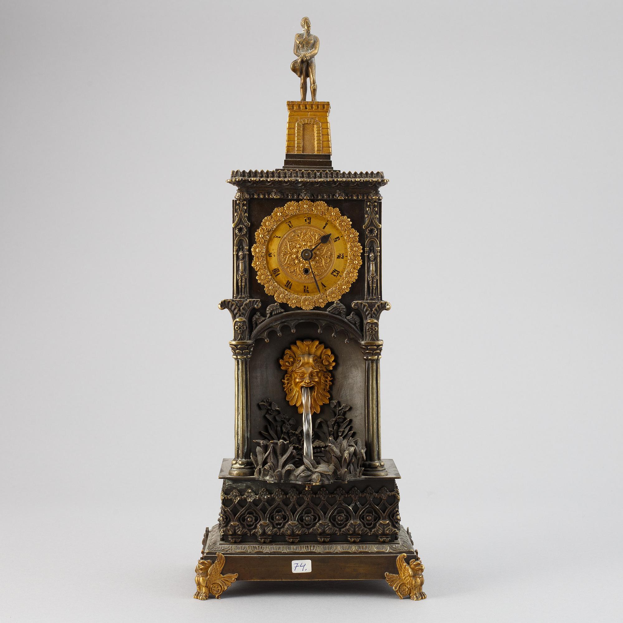 A Neo-Gothic mantel clock, late 19th Century.