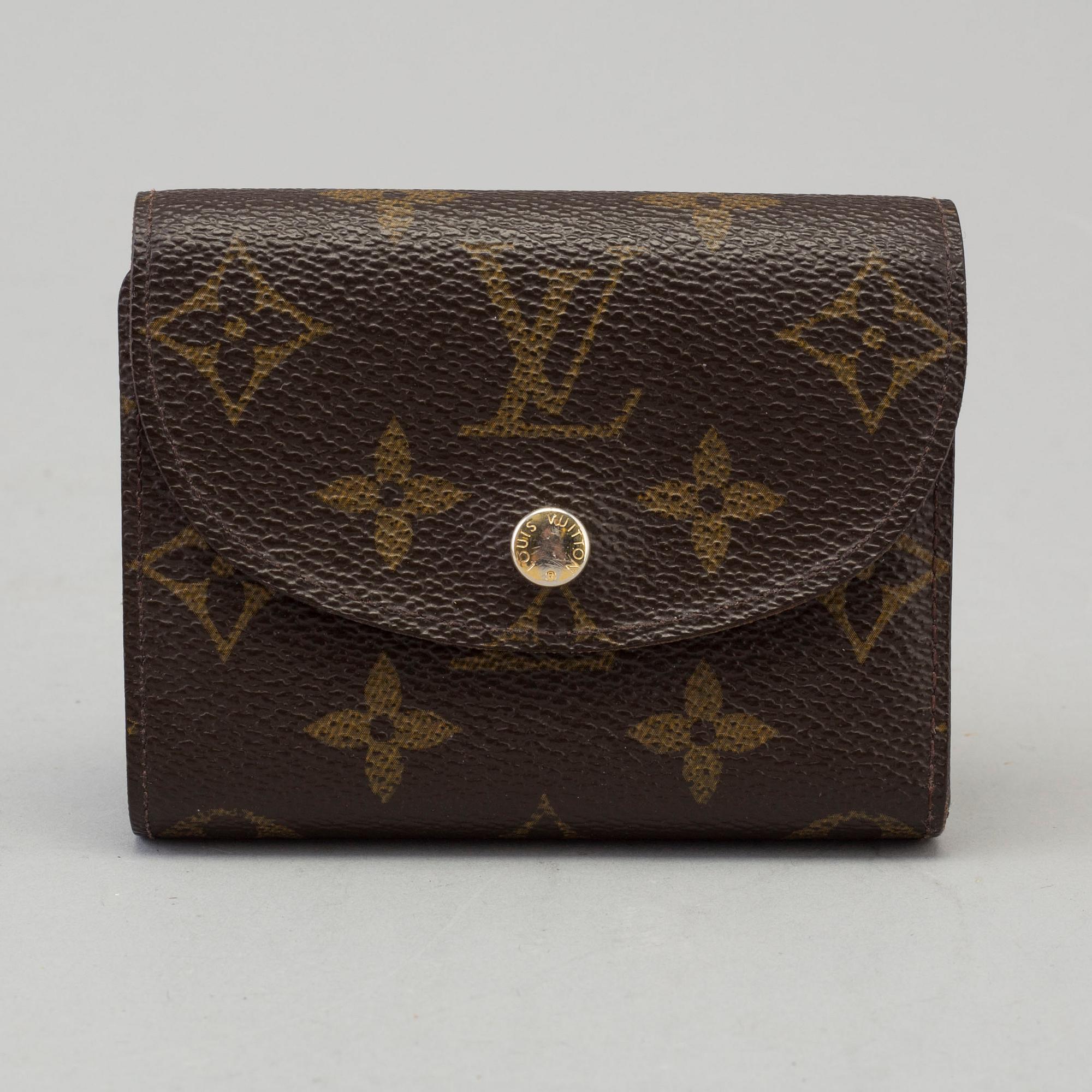 a LOUIS VUITTON 'Helene' wallet.