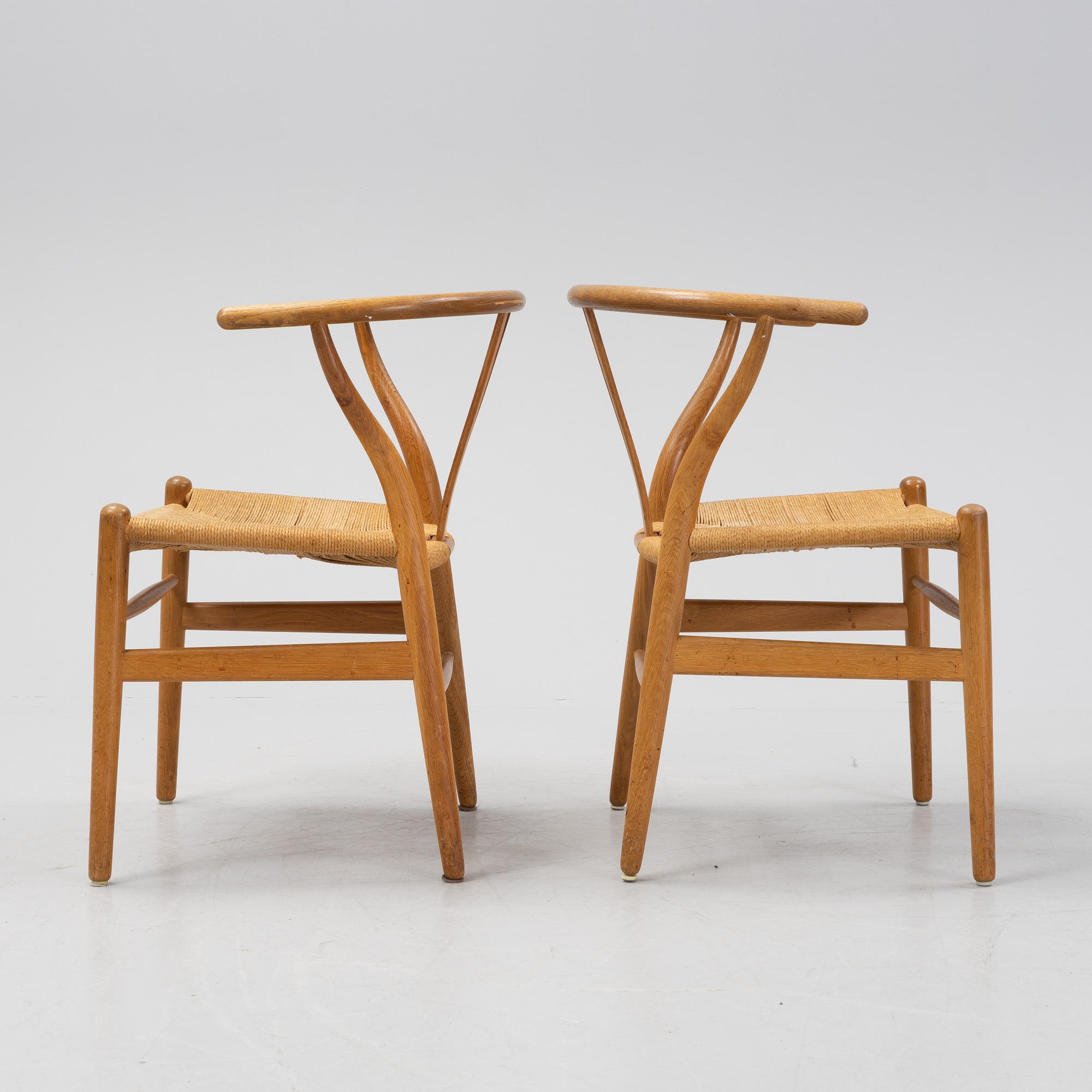 A pair of oak 'Y-chairs' by Hans J Wegner for Carl Hansen & Son, designed 1949.