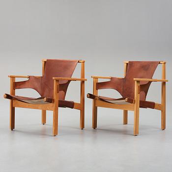 CARL-AXEL ACKING, a pair of 'Trienna' easy chairs, Källemo Sweden.