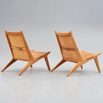 UNO & ÖSTEN KRISTIANSSON, a pair of "Hunting chairs" model 204, for Luxus, Vittsjö, Sweden 1960's.