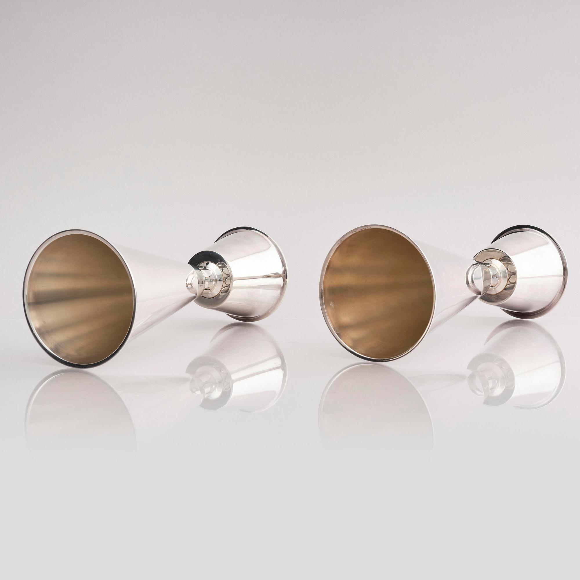 Guldsmedsaktiebolaget (GAB), a pair of sterling silver candlesticks, design Vera Ferngren, Stockholm, Sweden 1968.