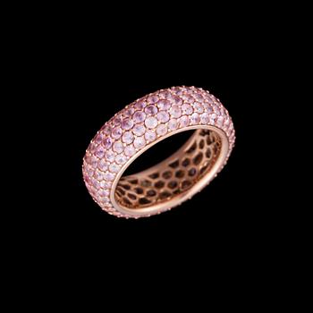 478. AN ETERNITY RING, 18K rose gold, pink sapphires. Weight c. 8.0 g.