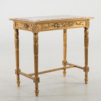 A Louis XVI-style table, first half of the 20th century.