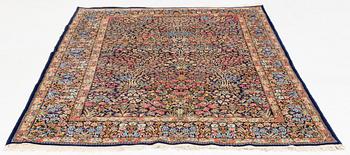 A carpet, old Kerman, ca 279 x 176 cm.