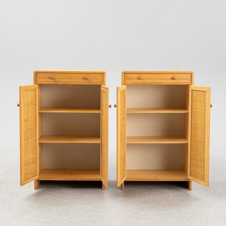 Yngve Ekström, two 'Furubo' pine and rattan cupboards, Swedese, mid 20th century.