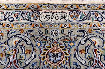 A carpet, Kashan, signed, c. 427 x 296 cm.