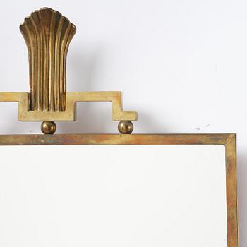 Lars Holmström, a Swedish Grace brass wall mirror, Arvika, 1920-30s.