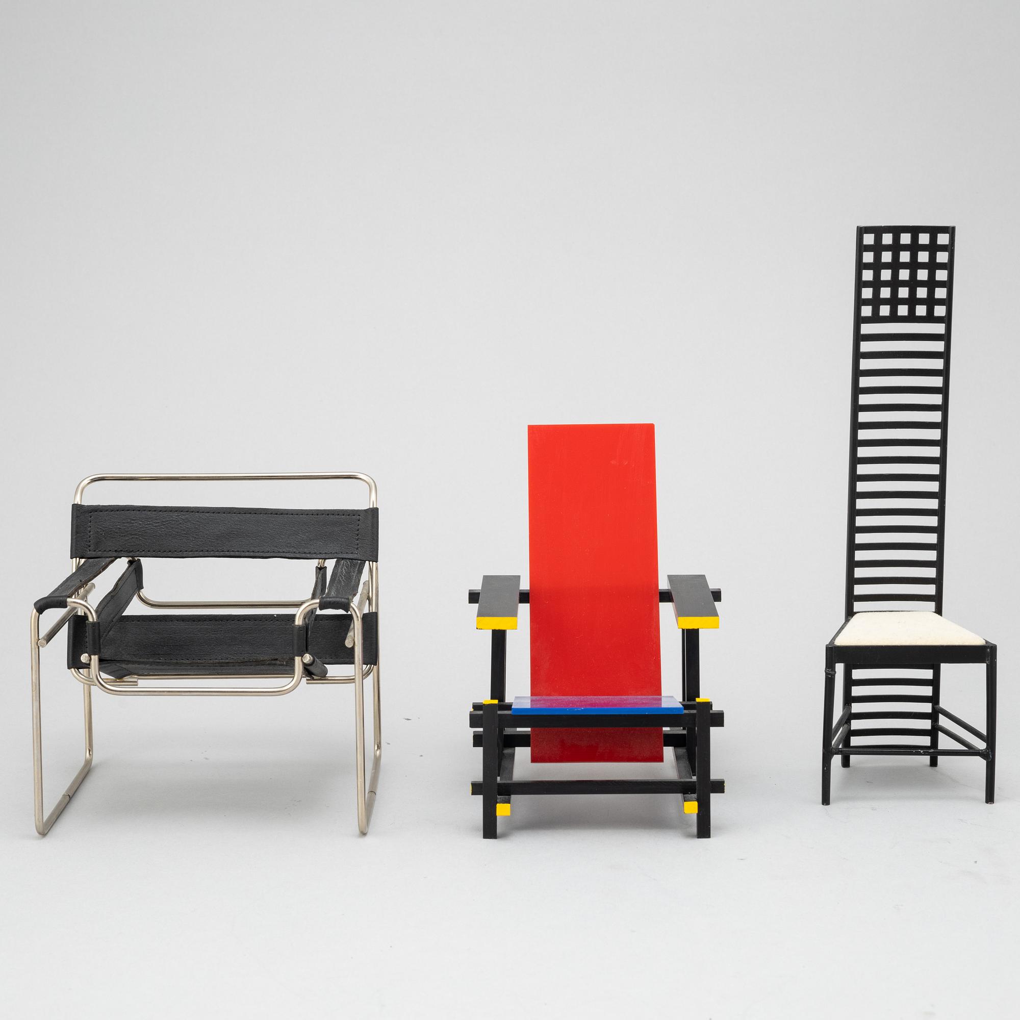 Miniatures of three famous design chairs, 21st century.