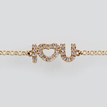 ARMBAND, 18K guld med briljantslipade diamanter ca 0.10 ct. Vikt 1,1 gram.