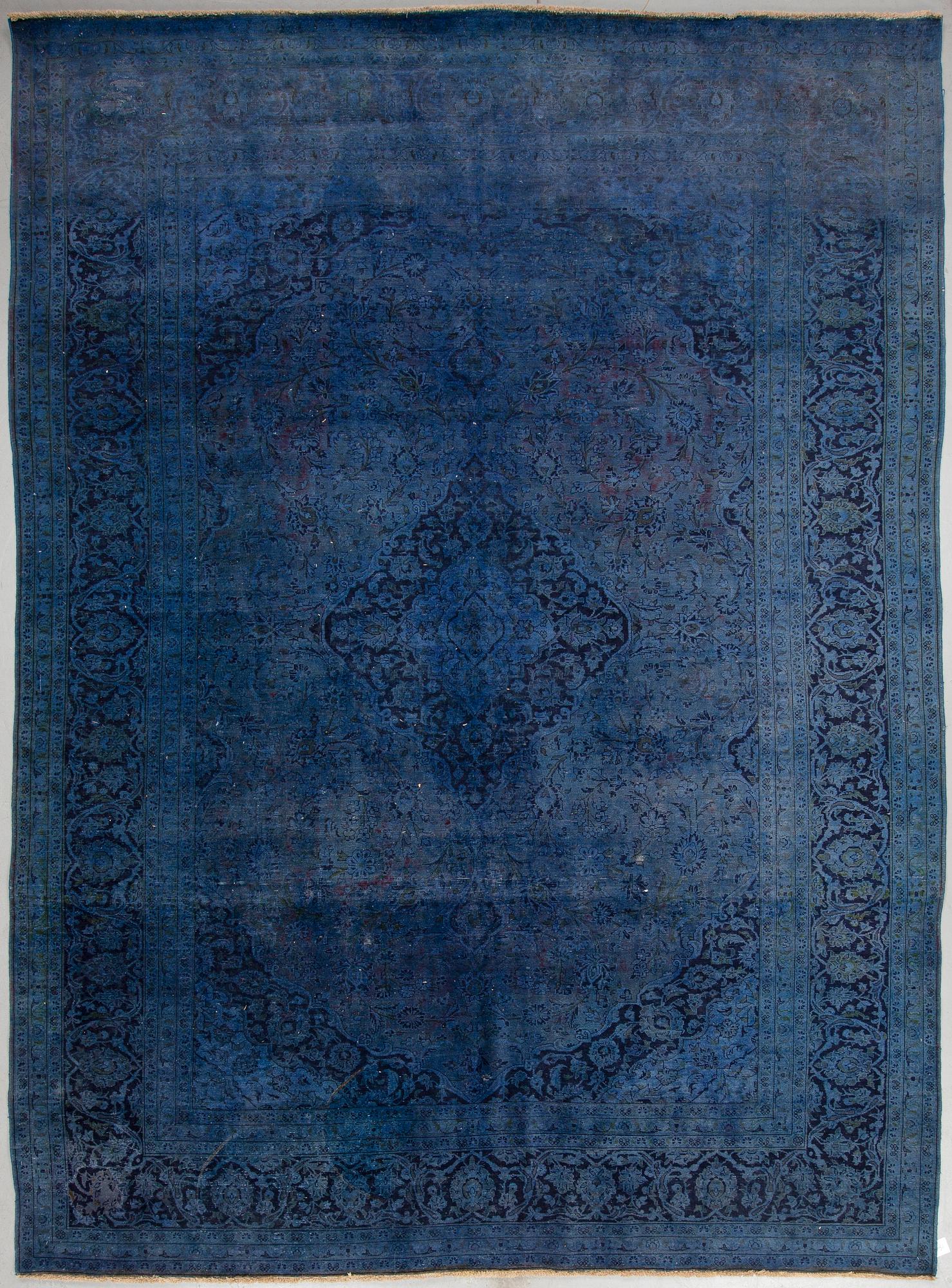 An oriental carpet, ca 408 x 299 cm.