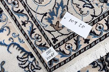 A rug, Nain, part silk, so called 9 LAA, ca 233 x 164 cm.