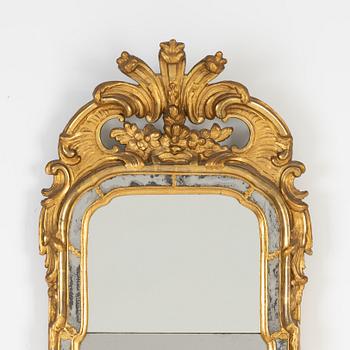 A rococo mirror, second half of 18th Century,