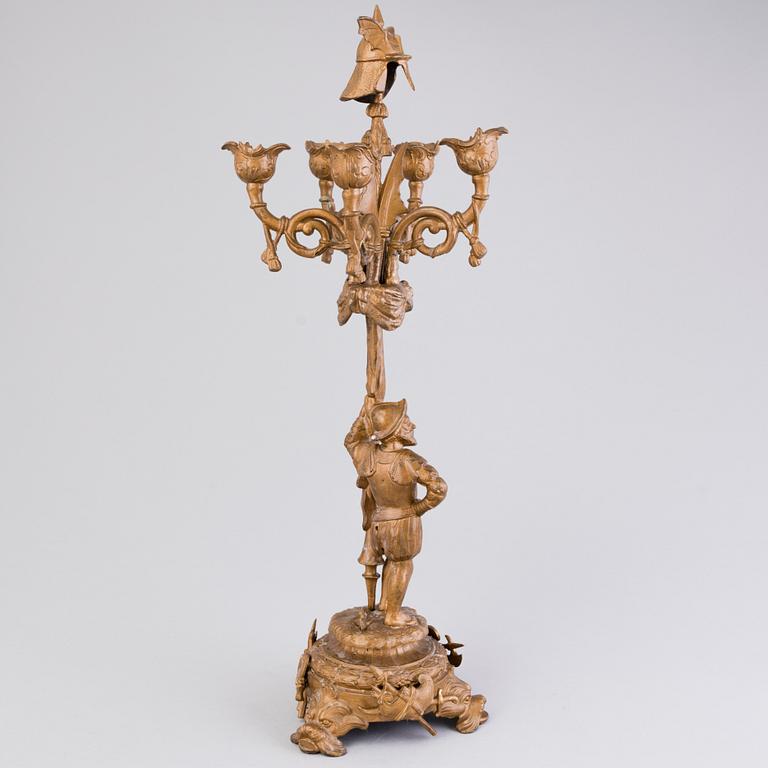 A candelabrum in copper metal alloy, end of the 19th Century.