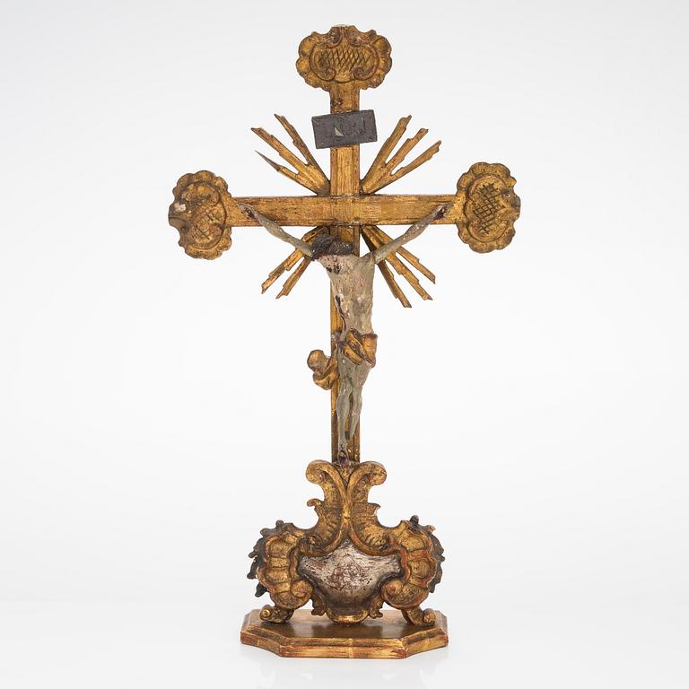 A 19th century gilded and painted wood crucifix.