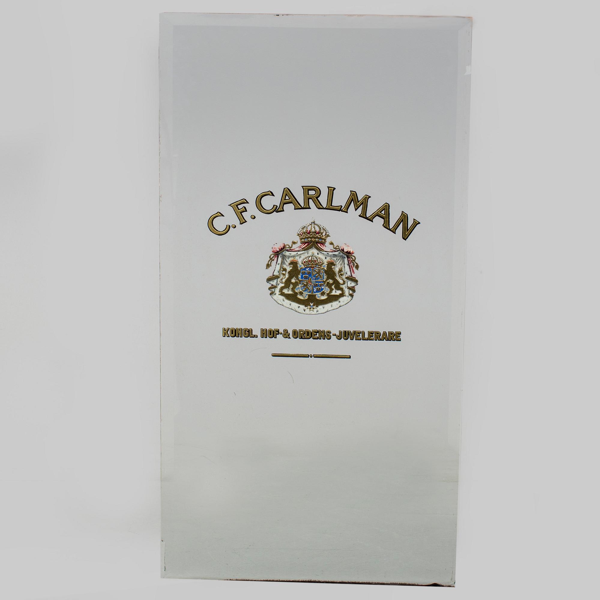 REKLAMSKYLT I GLAS, Firma C F Carlman, Stockholm, 1900-talets första hälft.