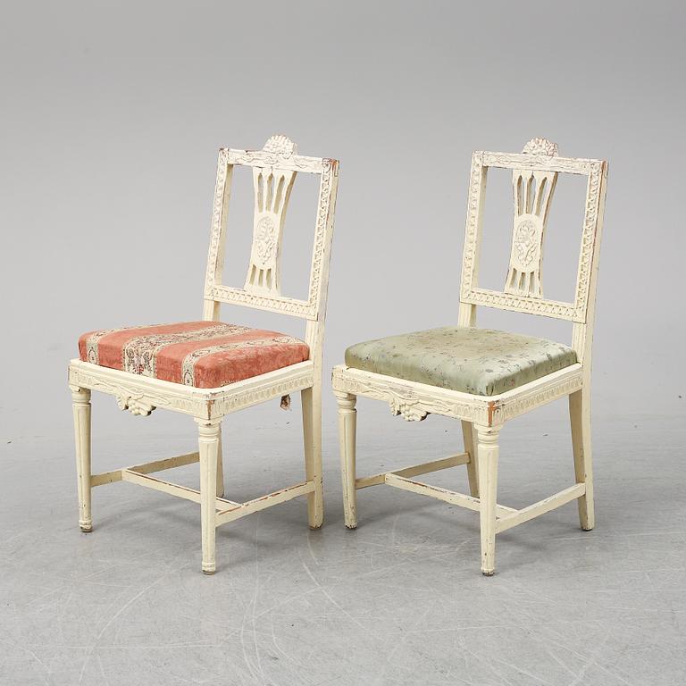 Seven Gustavian chairs from around year 1800.