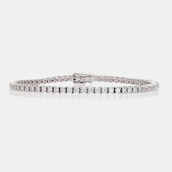 1209. A 2.54 ct brilliant-cut diamond bracelet.