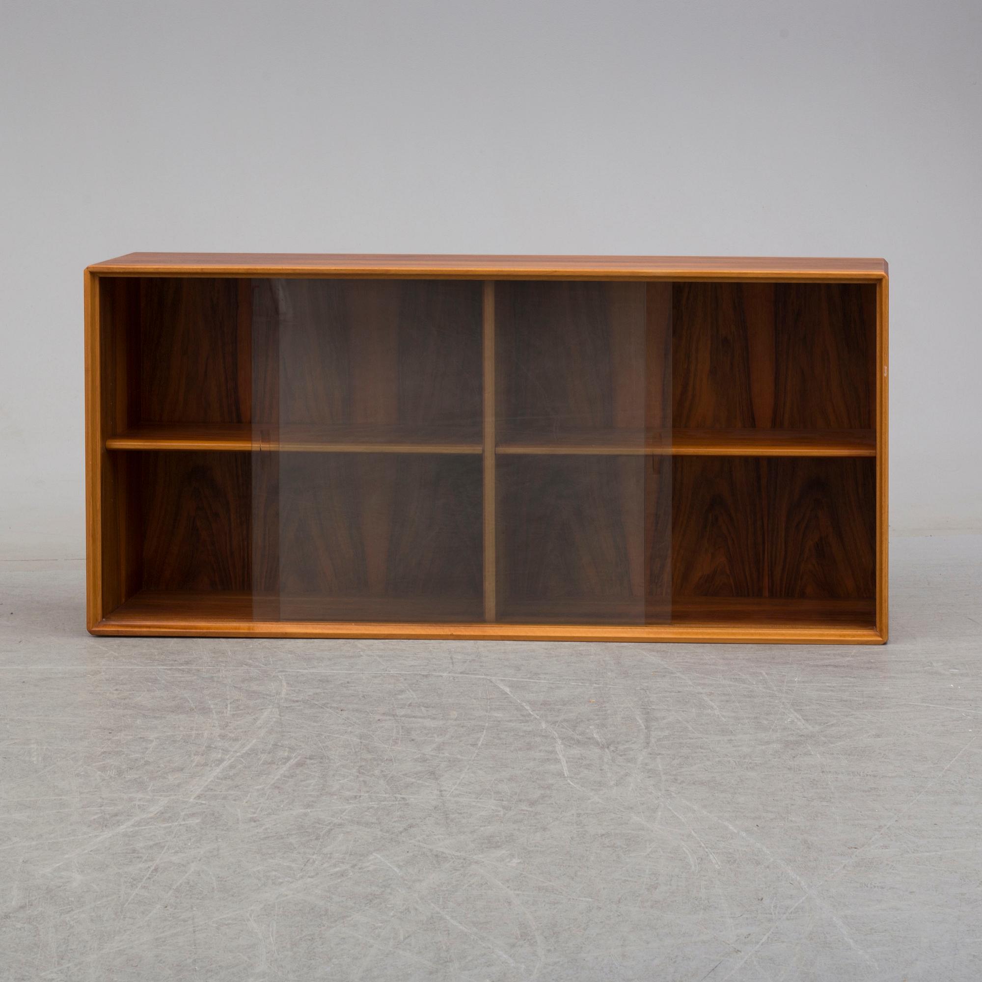 A 1960s walnut veneer wall cabinet.