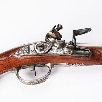 A flintlock pistol signed by Anders Wåhlberg Stockholm, (1720-93).