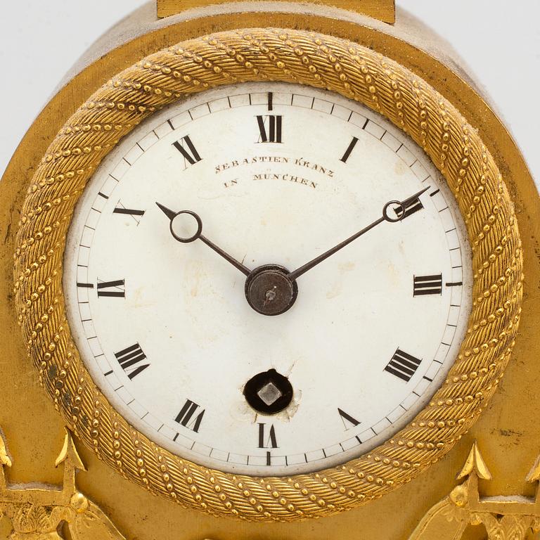 A German Empire mantel clock, early 19th century.