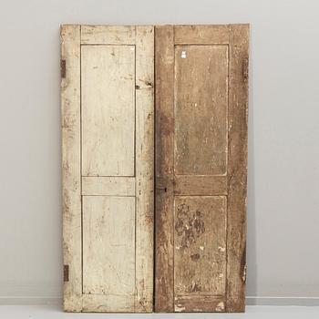 A pair of South East Asian carved wooden doors, presumably Java, 19th Century.