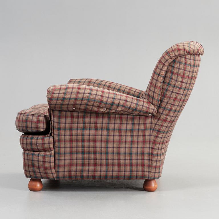 Josef Frank, a 'model 336' armchair, by Svenskt Tenn, Sweden.