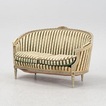 A four piece Gustavian style furniture group, first half of the 20th century.