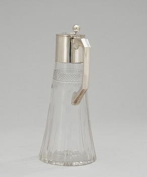 A glass and silver jug, Austria 1901-1921.