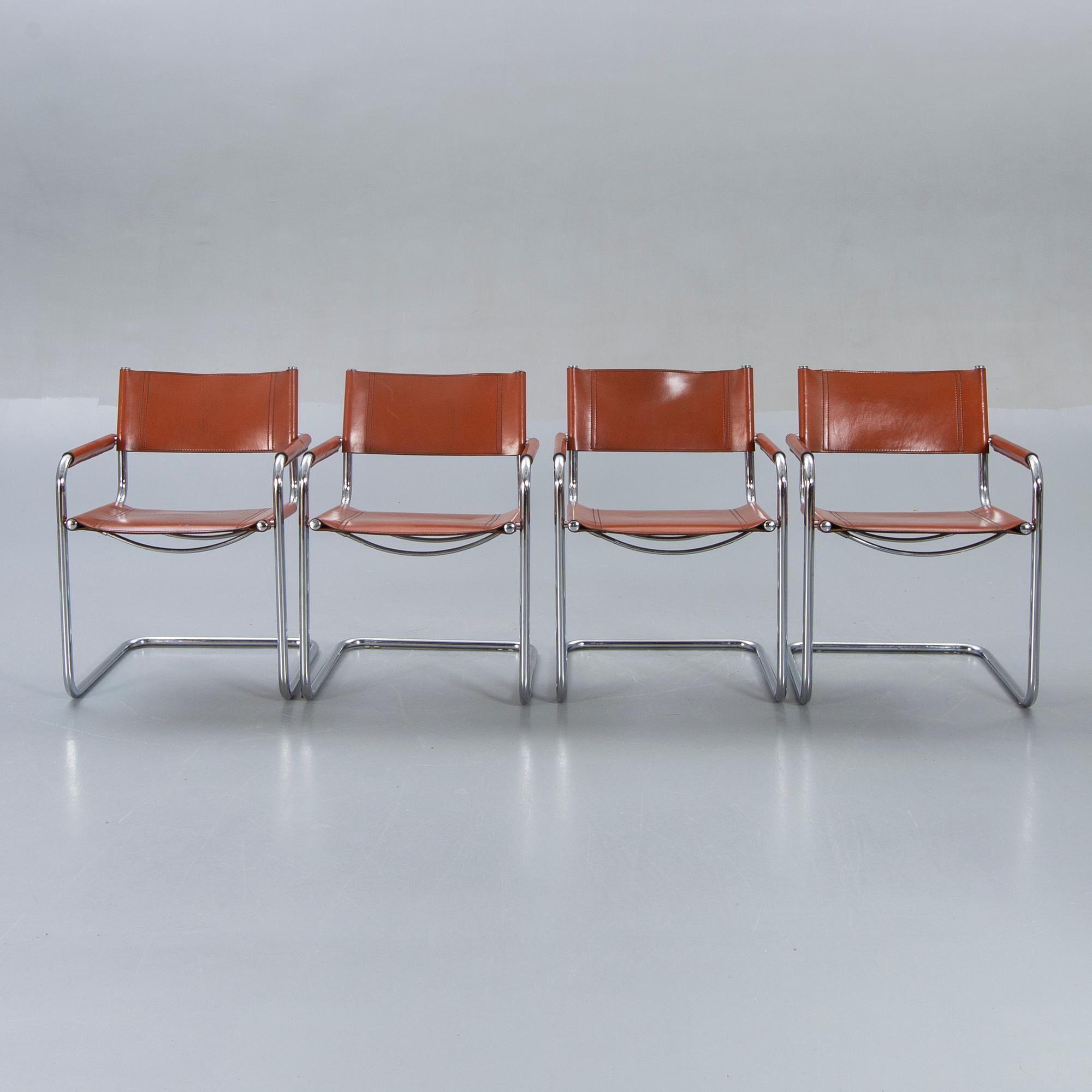 A swet of four Italien leather armchairs later part of the 20th century.