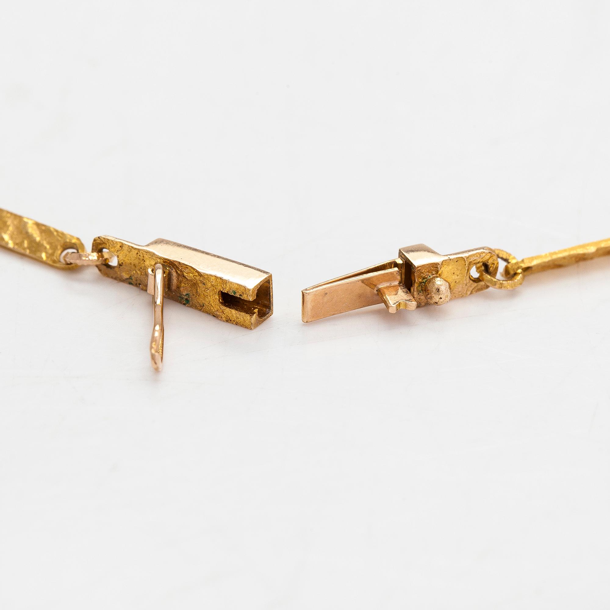 Björn Weckström, Halsband "Janus", 14K guld, rökkvarts och bergskristall. Lapponia 1969.